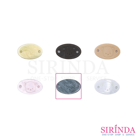 ป้ายเรซิ่นวงรี เลเซอร์ หน้าหมี พร้อมเจาะรูสำหรับเย็บ Laser Resin Tag (00420004)